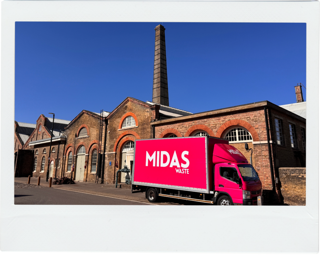 A bright pink Midas Waste vehicle outside The Historic Dockyard Chatham – a long-standing customer of Midas Waste