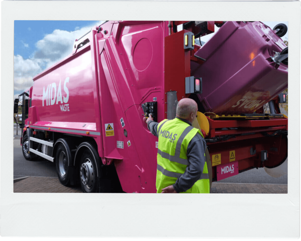 A member of the Midas Waste team empties a wheelie bin in Kent