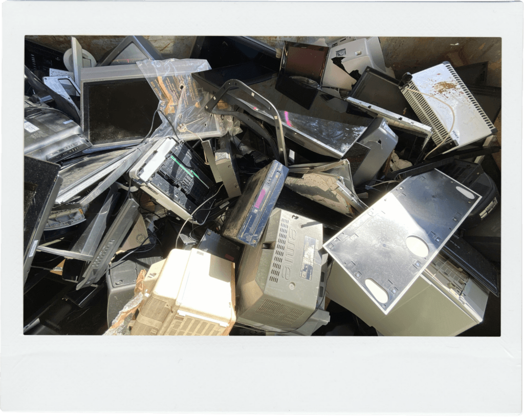 Broken and discarded electronic equipment (WEEE waste) in a pile