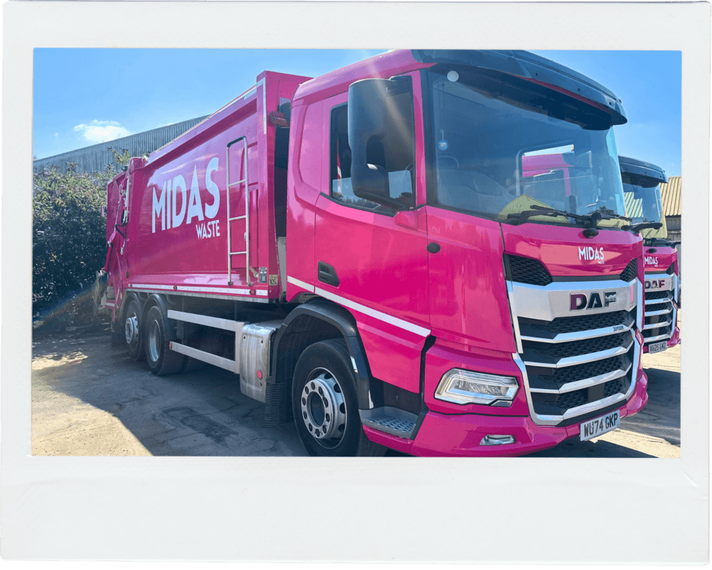 A Midas Waste dustcart parked in the sunshine on a bright day in Kent